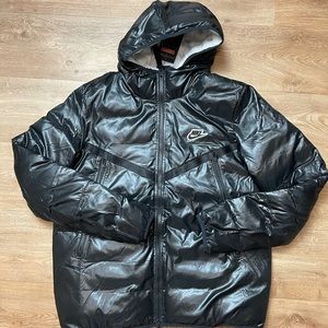 Brand new black Nike sportswear synthetic-fill windrunner, size large.